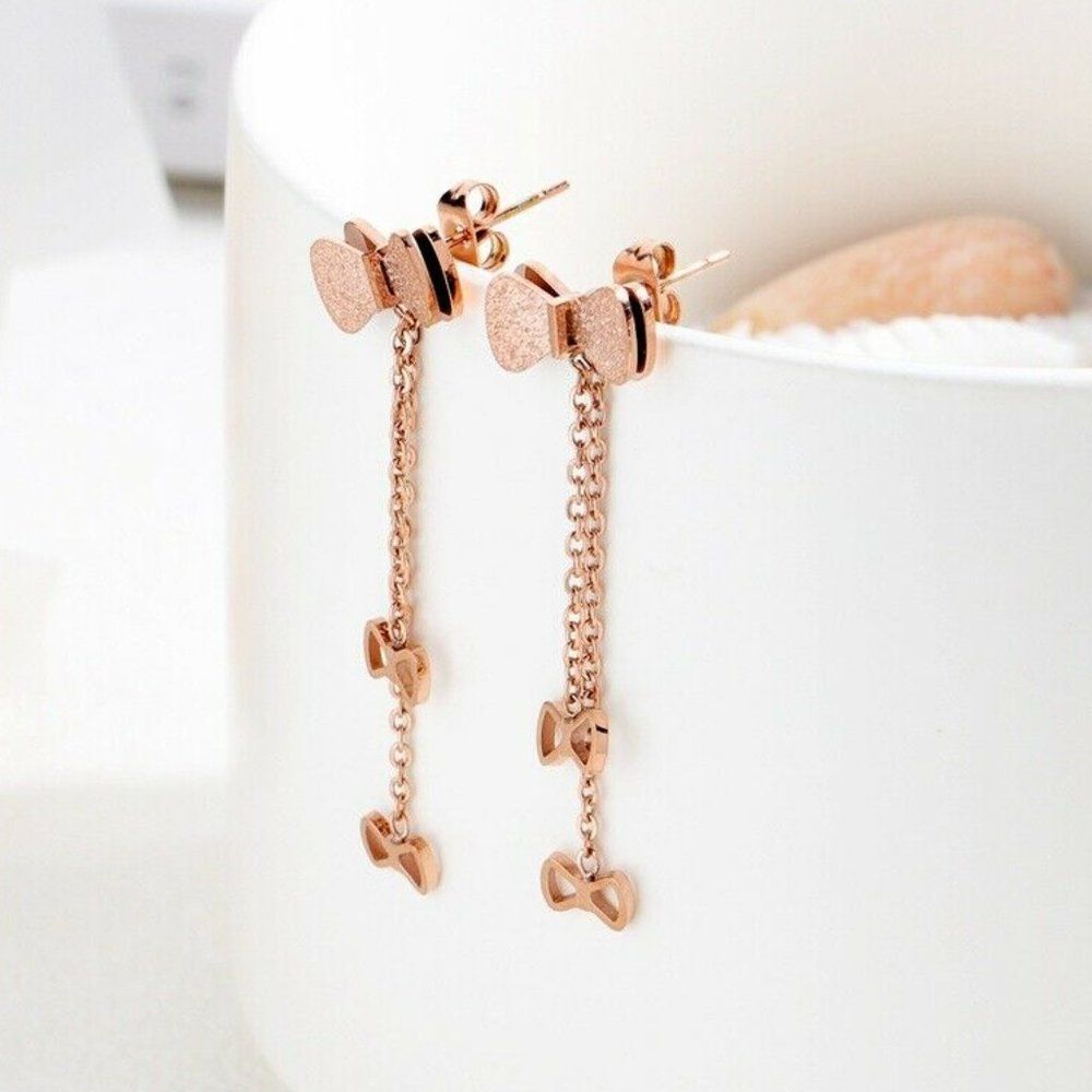 Womens Luna Delicate Bow Rose Gold Linear Earrings